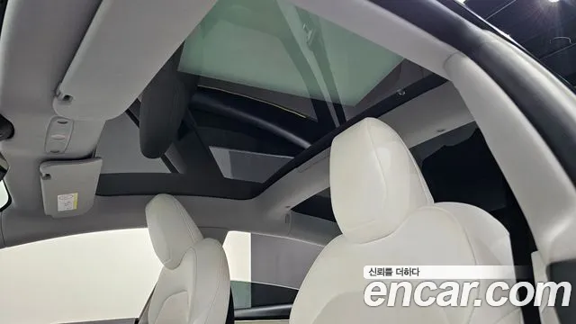 Tesla Model 3 — Фото автомобиля 19
