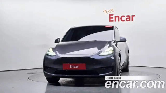 Tesla Model Y — Фото автомобиля 2