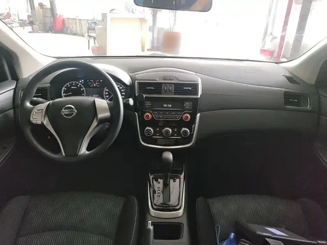Nissan Tiida — Фото автомобиля 9