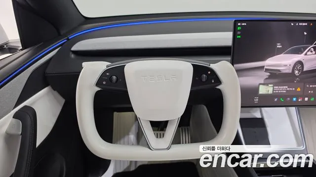 Tesla Model Y — Фото автомобиля 13