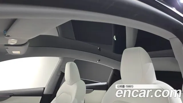 Tesla Model Y — Фото автомобиля 22