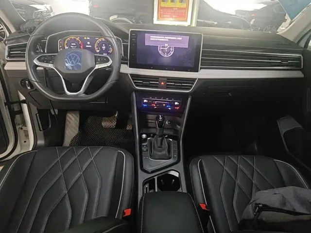 Volkswagen Tiguan L — Фото автомобиля 9