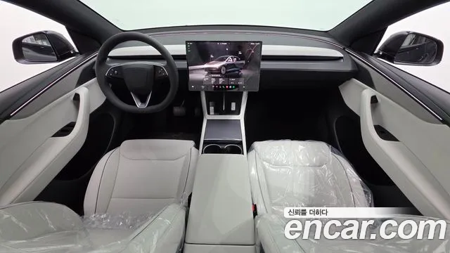 Tesla Model Y — Фото автомобиля 7