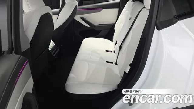 Tesla Model Y — Фото автомобиля 9