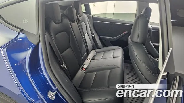 Tesla Model 3 — Фото автомобиля 11