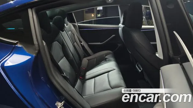 Tesla Model 3 — Фото автомобиля 12