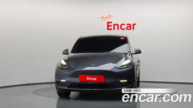 Tesla Model Y — Фото автомобиля 3