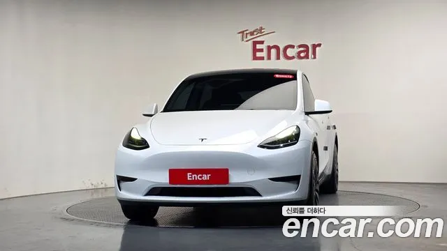 Tesla Model Y — Фото автомобиля 3