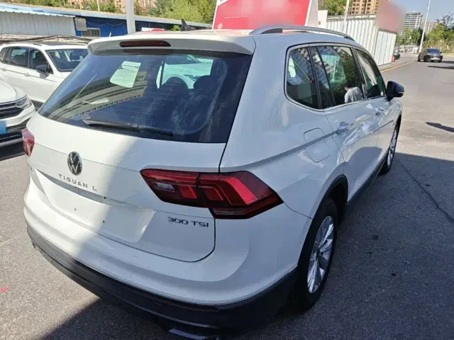Volkswagen Tiguan L — Фото автомобиля 6