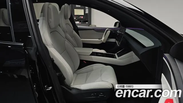 Tesla Model Y — Фото автомобиля 16