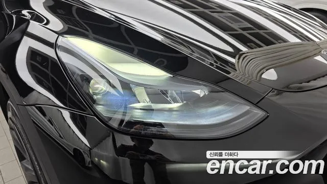 Tesla Model Y — Фото автомобиля 7