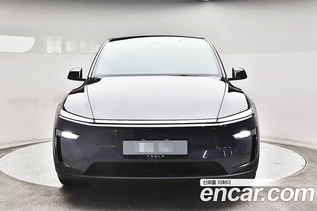Tesla Model Y — Фото автомобиля 3