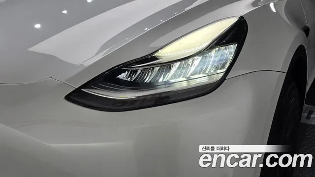 Tesla Model Y — Фото автомобиля 7