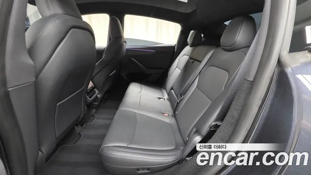 Tesla Model Y — Фото автомобиля 18
