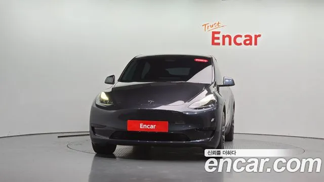 Tesla Model Y — Фото автомобиля 3