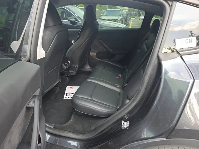 Tesla Model Y — Фото автомобиля 16