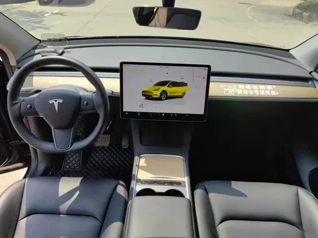 Tesla Model Y — Фото автомобиля 10