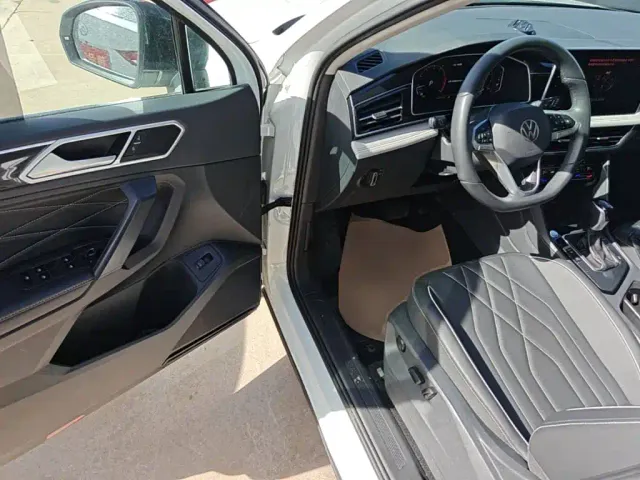 Volkswagen Tiguan L — Фото автомобиля 15
