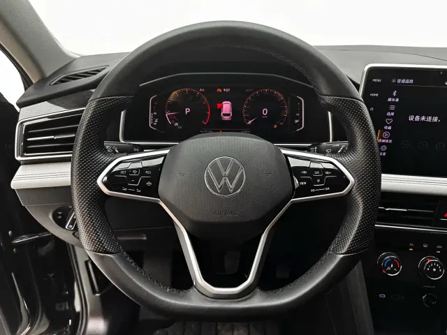 Volkswagen Tiguan L — Фото автомобиля 11