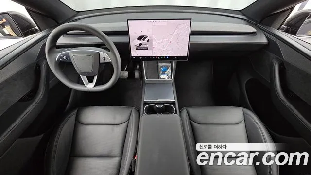 Tesla Model Y — Фото автомобиля 10