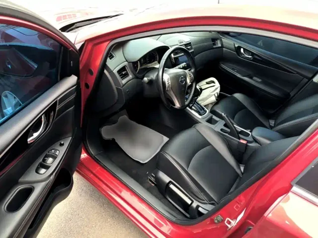 Nissan Tiida — Фото автомобиля 15