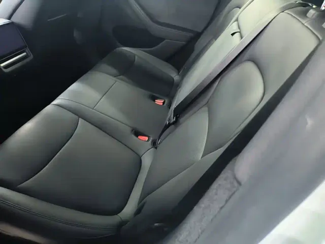 Tesla Model Y — Фото автомобиля 16