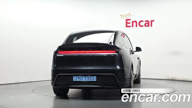 Tesla Model Y — Фото автомобиля 4