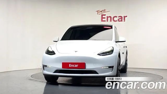 Tesla Model Y — Фото автомобиля 3