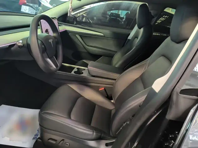 Tesla Model Y — Фото автомобиля 14