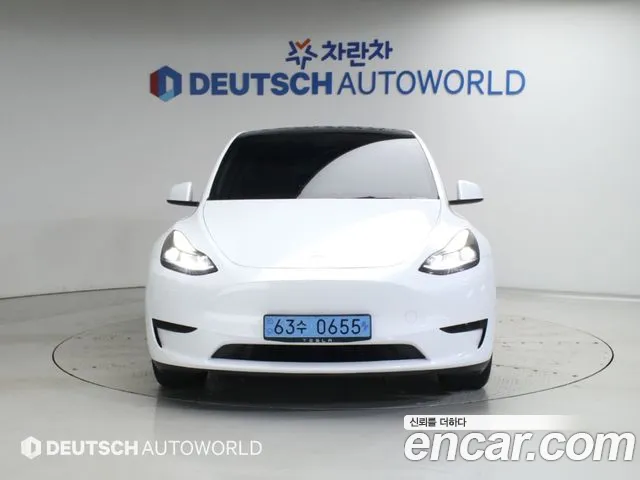 Tesla Model Y — Фото автомобиля 3
