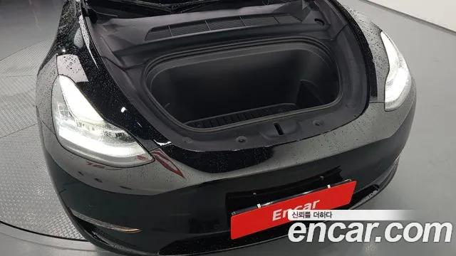Tesla Model Y — Фото автомобиля 6