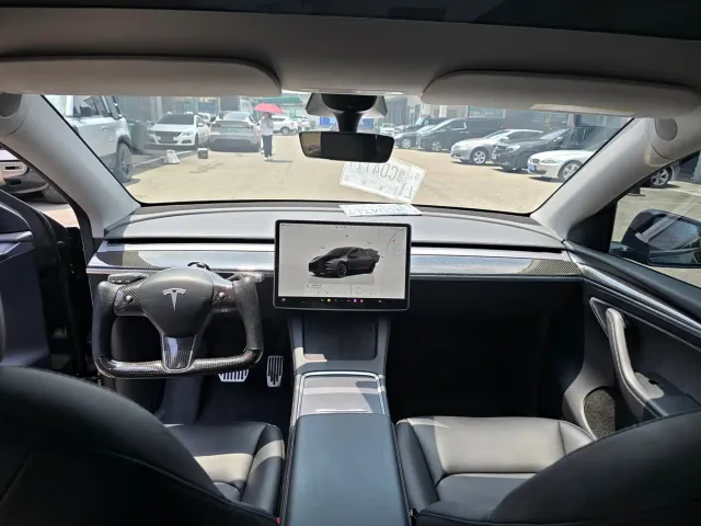 Tesla Model Y — Фото автомобиля 6
