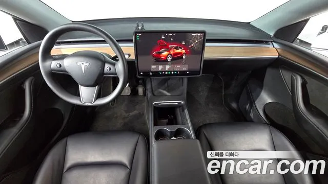 Tesla Model Y — Фото автомобиля 6