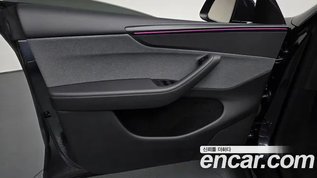 Tesla Model Y — Фото автомобиля 13