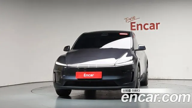 Tesla Model Y — Фото автомобиля 3