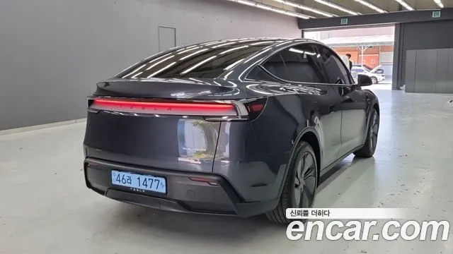 Tesla Model Y — Фото автомобиля 4