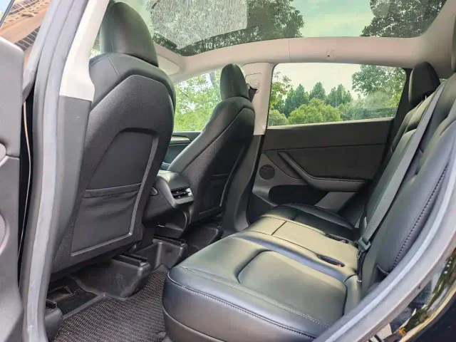 Tesla Model Y — Фото автомобиля 9