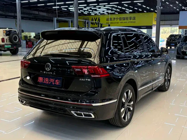 Volkswagen Tiguan L — Фото автомобиля 11