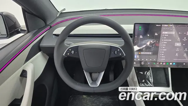 Tesla Model Y — Фото автомобиля 13