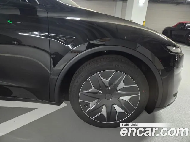 Tesla Model Y — Фото автомобиля 5