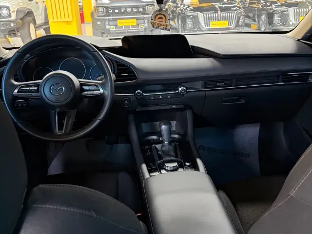 Mazda Axela — Фото автомобиля 7