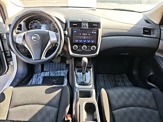 Nissan Tiida — Фото автомобиля 9