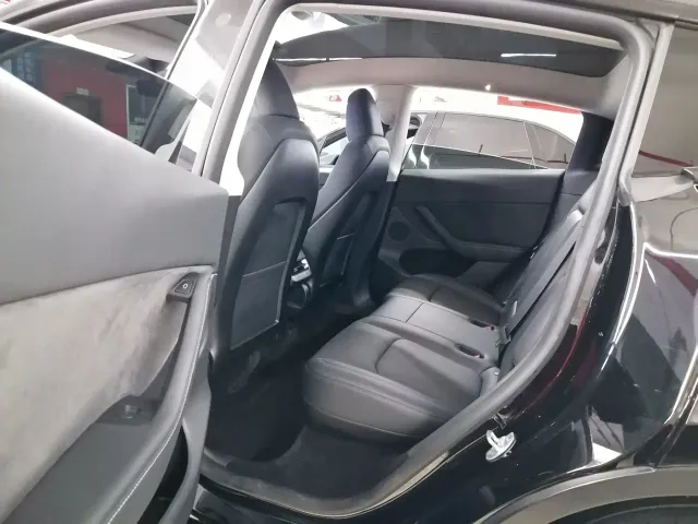Tesla Model Y — Фото автомобиля 7