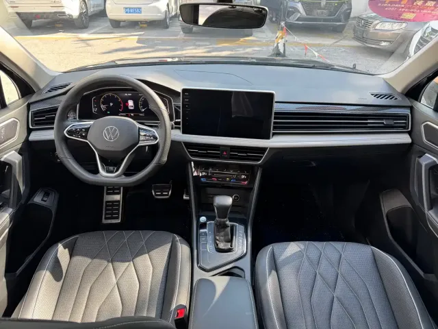 Volkswagen Tiguan L — Фото автомобиля 5