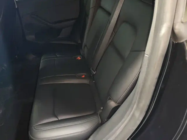 Tesla Model Y — Фото автомобиля 16
