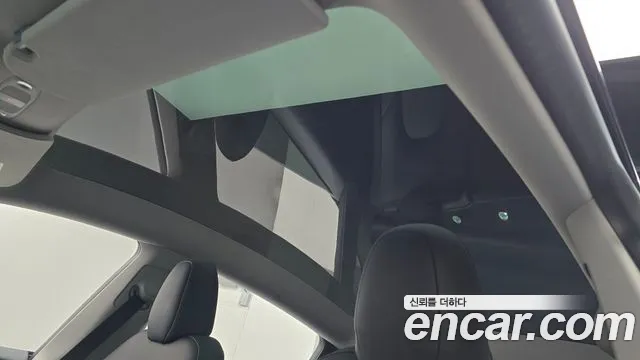 Tesla Model Y — Фото автомобиля 22