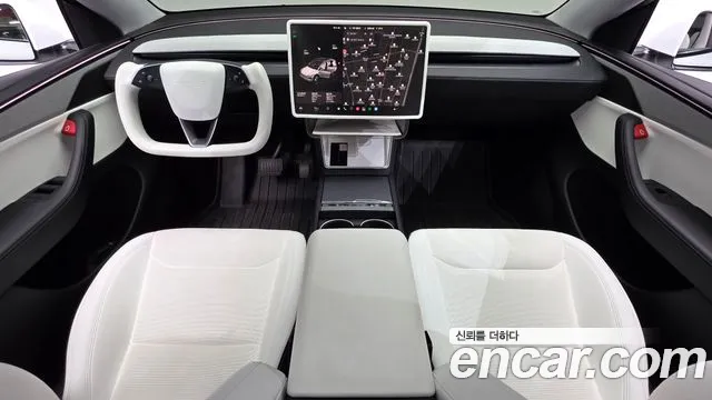 Tesla Model Y — Фото автомобиля 7