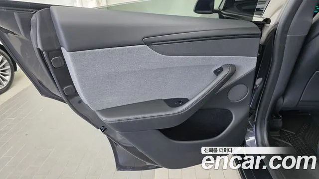 Tesla Model Y — Фото автомобиля 14
