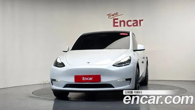 Tesla Model Y — Фото автомобиля 3