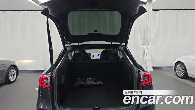 Tesla Model Y — Фото автомобиля 19